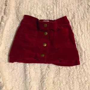 A cute red two pocket skirt